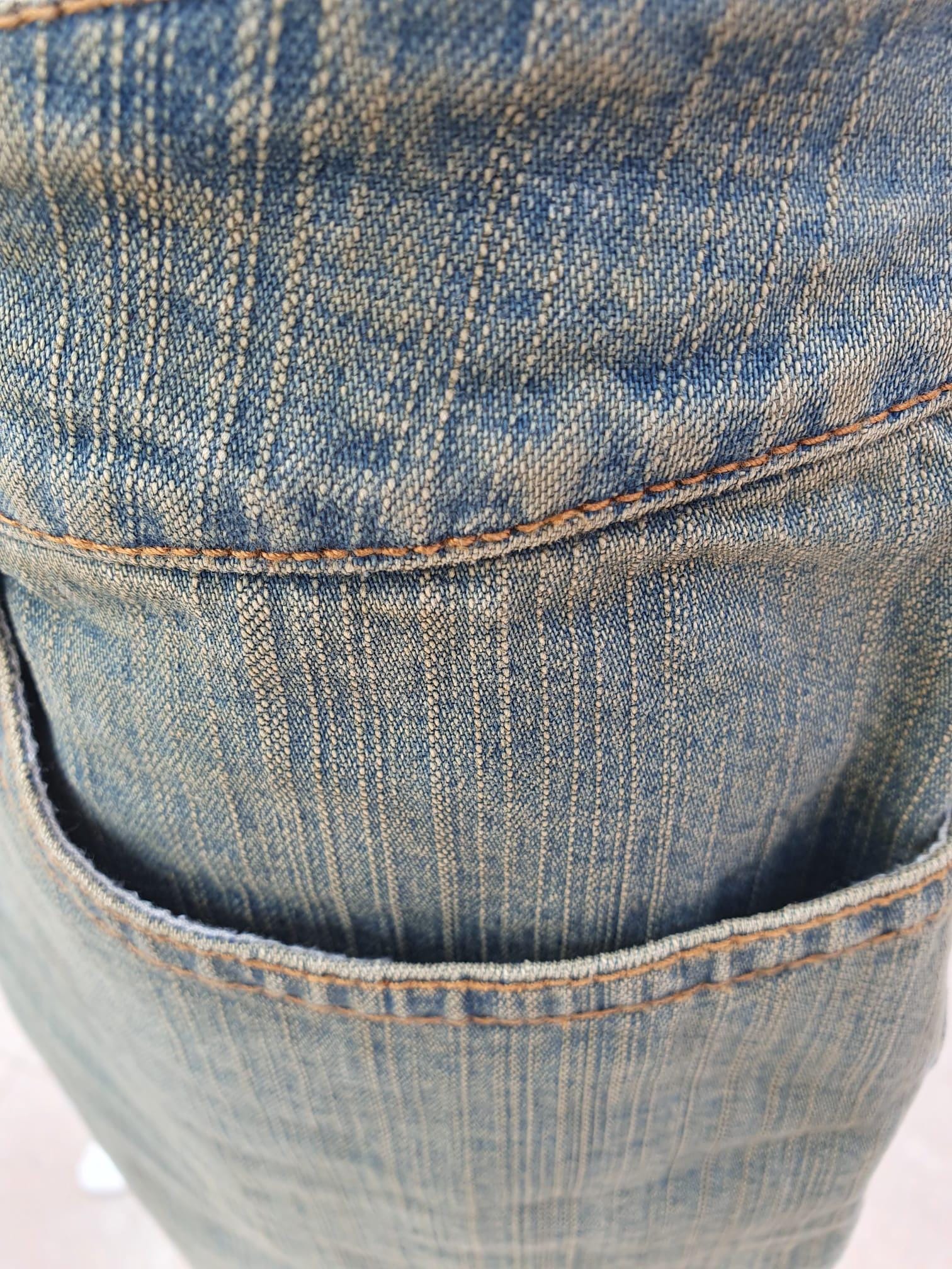 Vintage Minijupe taille basse en denim vieilli à Lacets — Taille 36 FR