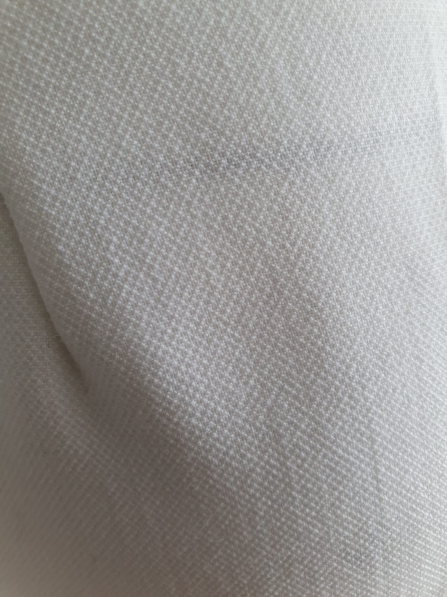 Pantalon palazzo blanc - vue bas de jambe et tombant