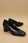 Escarpins noirs cuir fond beige