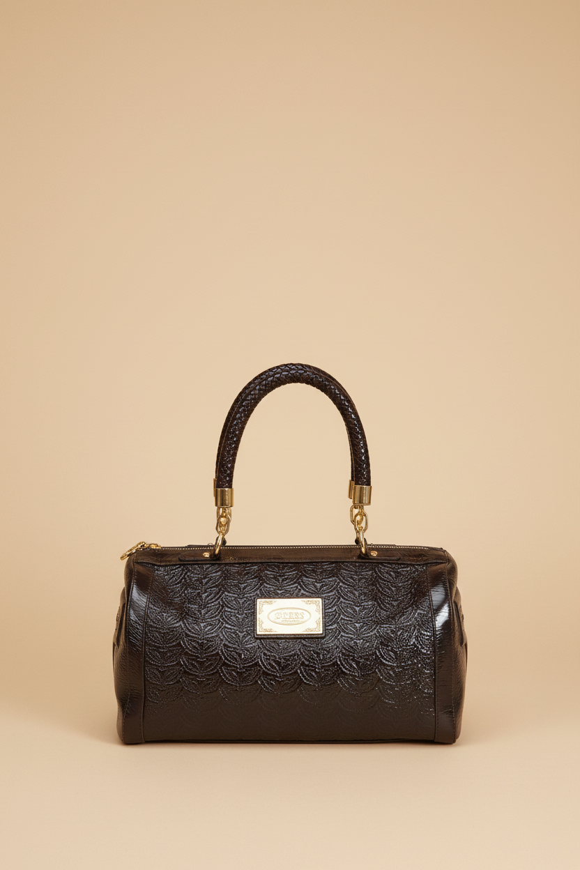 Sac bowling Silvio Tossi cuir embossé chocolat — fond beige